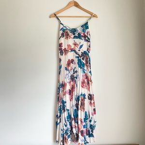 XS medium length summer dress. With adjustable strap.